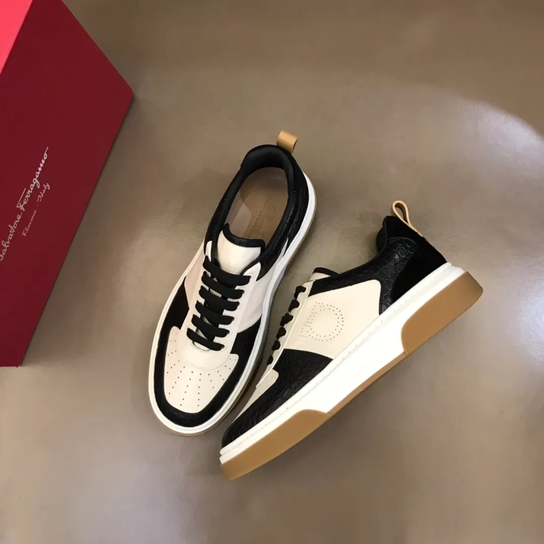 p440 "Salvatore Ferraga**" men's low-top fashion sneakers. This casual shoe has a novel structure and is made of soft calfskin. The contrasting color elements on the upper highlight the bold and avant-garde atmosphere. The first-layer cowhide lining is high-end and comfortable. Energetic and fresh, these shoes can be worn with casual looks or add a touch of street style to elegant trousers.  Size: 38-44